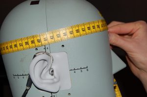 image of dummy head being measured